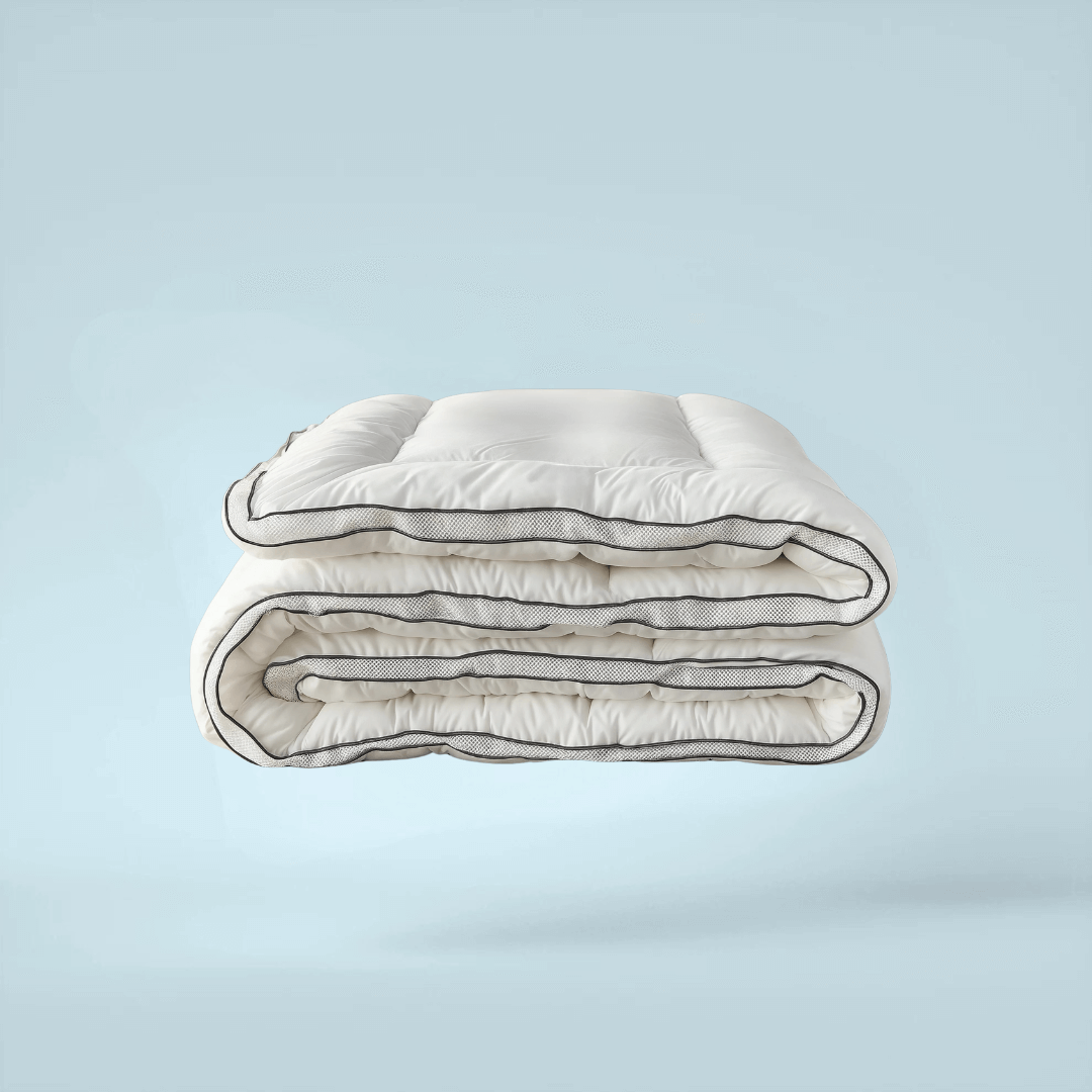 Easybed 3D Air Wit bundel met gratis 3D traagschuim hoofdkussen(s). Luxe ademend dekbed met vaste overtrek en perfecte temperatuurregeling het hele jaar door.